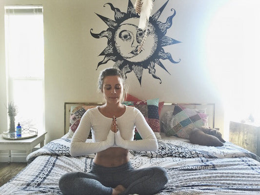 8 Energizing Yoga Asanas You Can Do In Bed